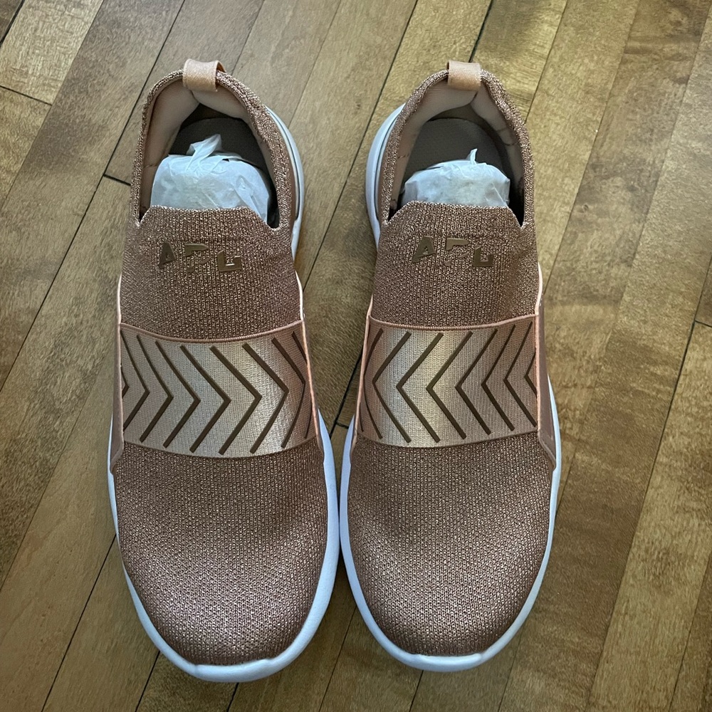 BRAND NEW. APL limited edition rose gold sneakers